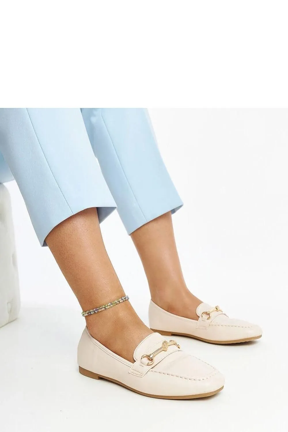 Light beige decorative moccasins