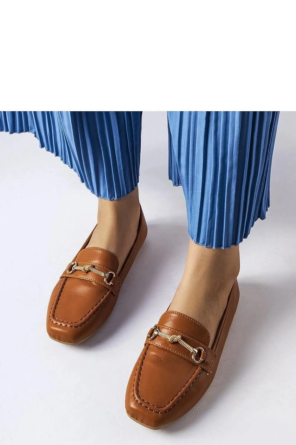 Light beige decorative moccasins