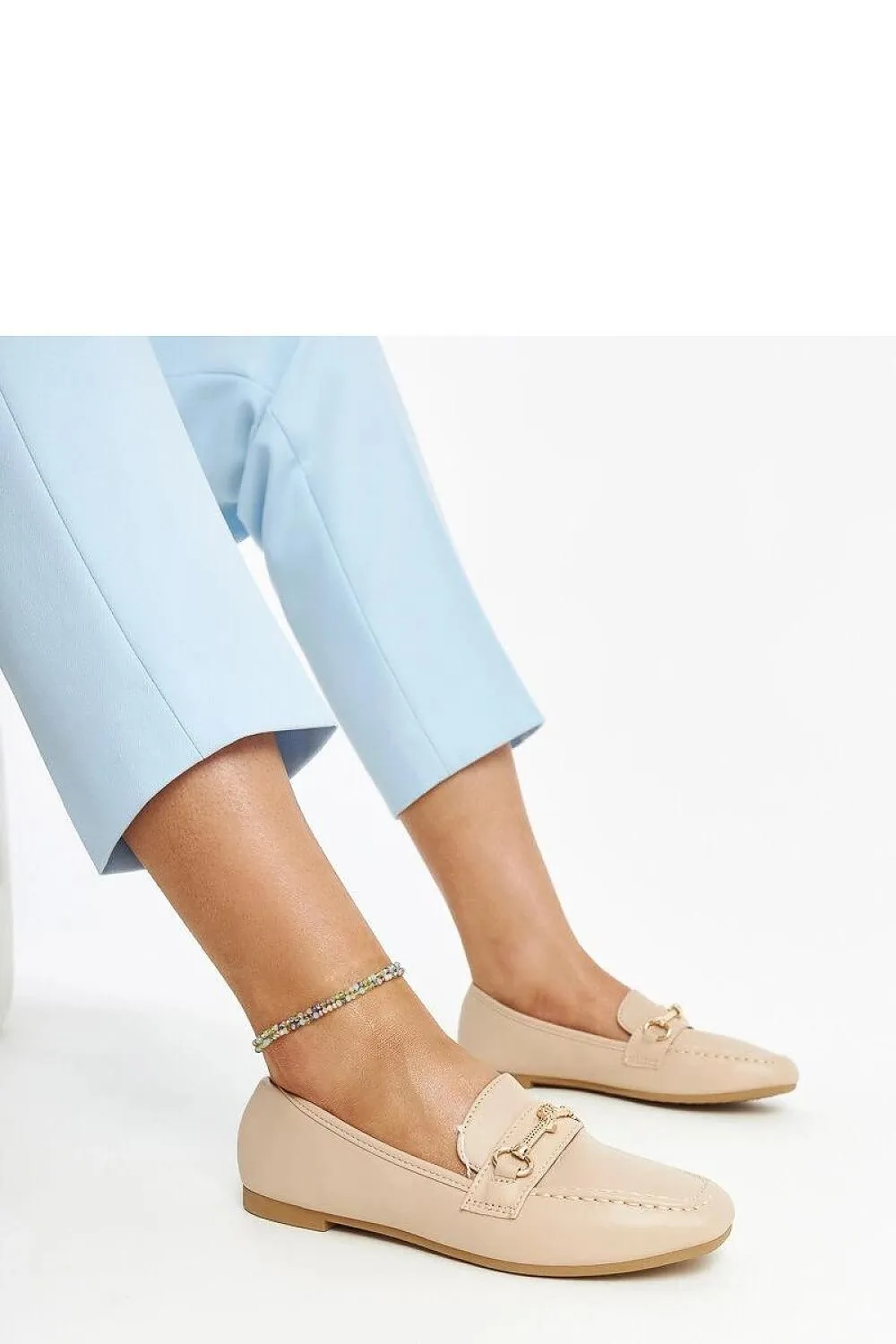 Light beige decorative moccasins